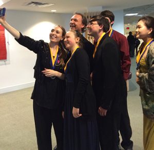 Mark and Maggie O'Connor take selfies with young performers.