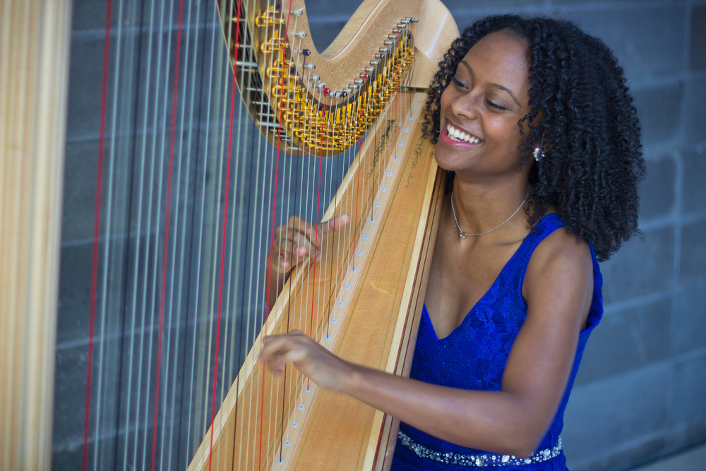 Arts Leadership grant winner Angelica Hairston plays her harp
