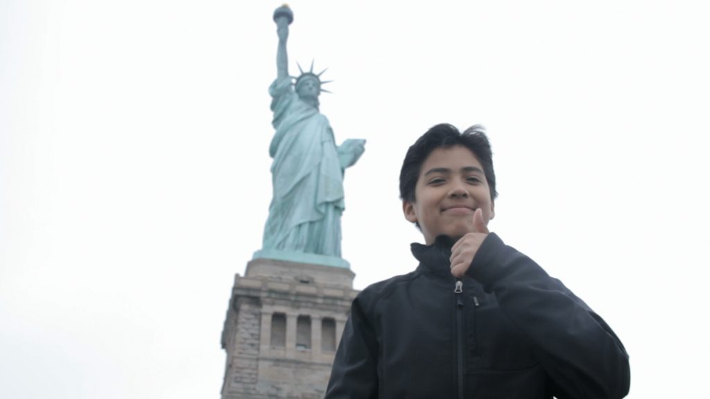 Oscar Paz-Suaznabar at the Statue of Liberty